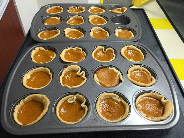 finished pumpkin pies in muffin tins