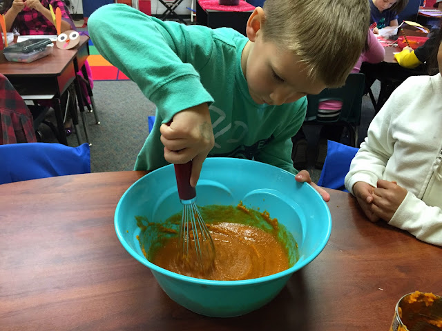mixing the pumpkin pie filling