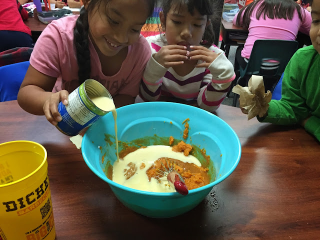 adding evaporated milk to pumpkin pie filling