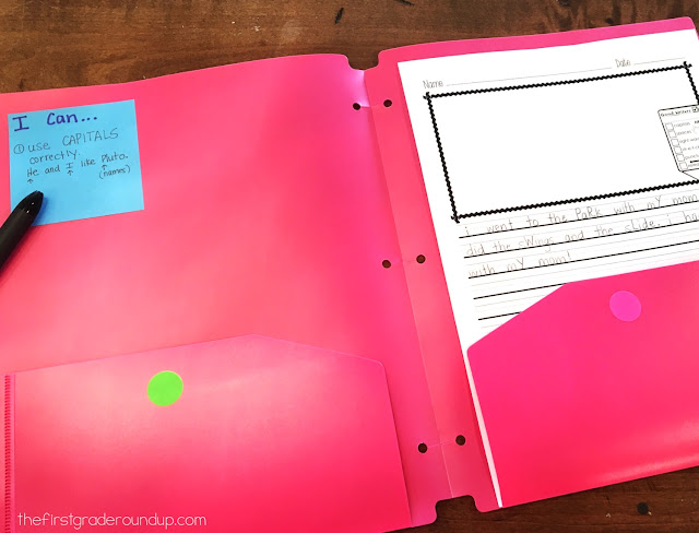 student writing folder